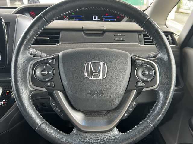 ホンダ フリード ハイブリット EX 東京都 2018(平30)年 6.7万km ホワイトオーキッドパール ワンオーナー/Panasonicポータブルナビゲーション（Bluetooth接続、フルセグテレビ）/カロッツェリア後席モニター/スマートキー/バックカメラ/ビルトインETC/三列シート/ウォークスルー/純正フロアマット/クルーズコントロール/プッシュスタート/ABS/横滑り防止機能/レーンキープアシスト/オートライト/スペアキー/ハーフレザーシート