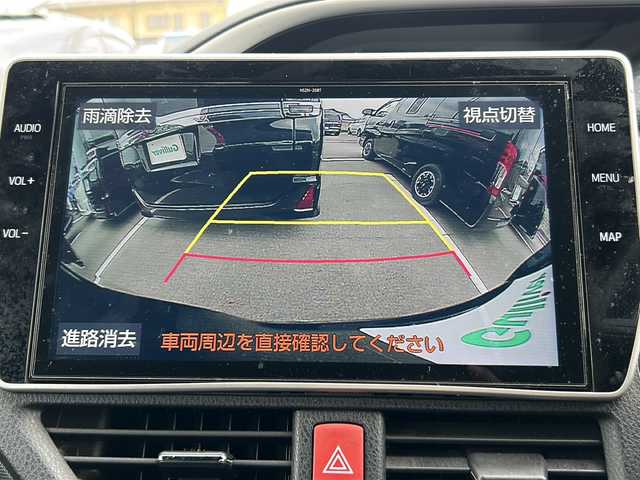 トヨタ ヴォクシー ハイブリッド ZS 煌Ⅲ 岐阜県 2021(令3)年 5.9万km ブラッキッシュアゲハガラスフレーク 登録時走行距離58535km/純正10インチナビ/バックモニター/後席モニター/フルセグテレビ/12インチ後席モニター/シートヒーター/クルーズコントロール/両側パワースライドドア/ETC2.0/フォグランプ/純正アルミホイール/オートライト/オートマチックハイビーム/レーンキープアシスト/LEDヘッドライト/純正フロアマット/スマートキー/プッシュスタート/ドアバイザー/禁煙車