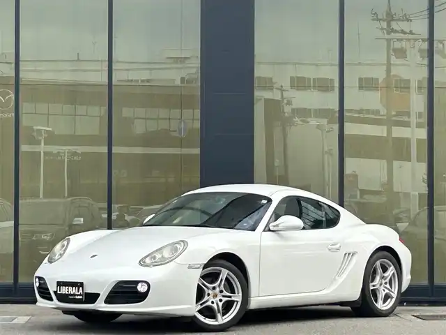 ポルシェ ケイマン 石川県 2010(平22)年 5.6万km パール 社外ナビ/　Bluetooth・AM/FM・CD・DVD/フルセグTV/ETC/シートヒーター/アンチロック・ブレーキ・システム/横滑り防止装置/HIDヘッドライト/純正アルミホイール