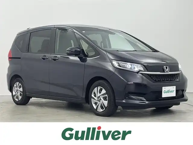 ホンダ フリード ハイブリット G 埼玉県 2024(令6)年 0.5万km トワイライトミストブラックパール 純正ナビ　バックカメラ　ホンダセンシング　アダプティブクルーズコントロール　シートヒーター　ＬＥＤヘッドライト　地デジフルセグＴＶ　両側パワースライドドア　プッシュスタート　スマートキー