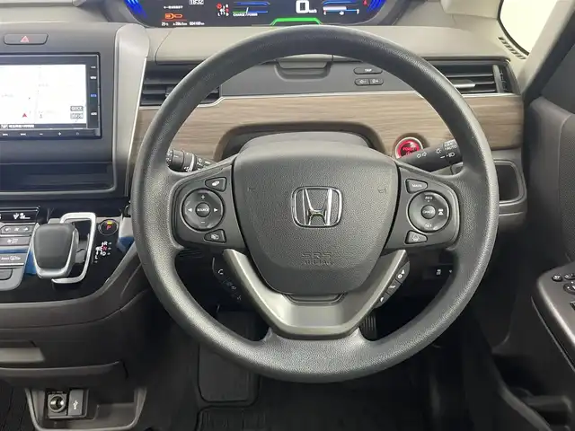 ホンダ フリード ハイブリット G 埼玉県 2024(令6)年 0.5万km トワイライトミストブラックパール 純正ナビ　バックカメラ　ホンダセンシング　アダプティブクルーズコントロール　シートヒーター　ＬＥＤヘッドライト　地デジフルセグＴＶ　両側パワースライドドア　プッシュスタート　スマートキー
