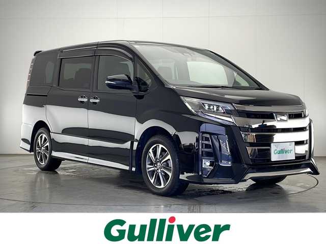 トヨタ ノア Si ダブルバイビーⅡ 宮崎県 2019(令1)年 4万km ブラック 車検R8年9月/純正9インチナビ/純正後席用12インチフリップダウンモニター/バックカメラ/(BT/CD/DVD/MSV)/両側パワースライドドア/衝突軽減システム/クルーズコントロール/車線逸脱警報/横滑り防止機能/クリアランスソナー/ハーフレザーシート/純正フロアマットマット/純正アルミホイール/ビルトインETC/社外ドライブレコーダー/LEDオートヘッドライト/オートマチックハイビーム/スマートキー×2