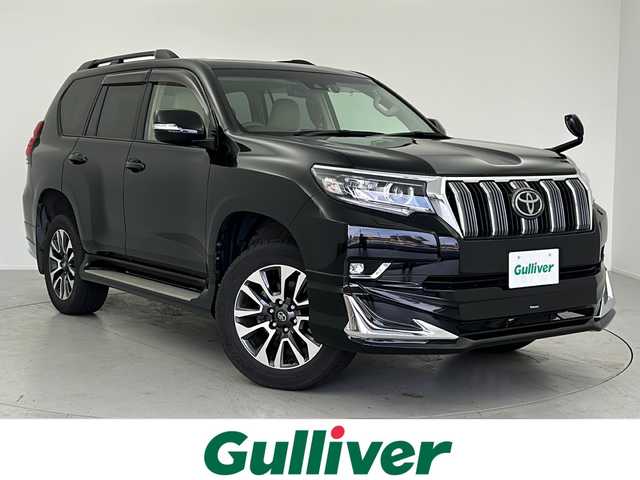 トヨタ ランドクルーザー プラド TX Lパッケージ 愛知県 2022(令4)年 4.7万km ブラック ガソリン/4WD(F4)/6速AT/モデリスタエアロ/チルト＆スライド電動ムーンルーフ/ルーフレール/９インチ純正ナビ【NSZT-Y68T】/(FM/AM/CD/DVD/フルセグ/Bluetooth)/前ドライブレコーダー/ETC/バックカメラ/ＴｏｙｏｔａＳａｆｅｔｙＳｅｎｓｅ/・踏み間違い防止アシスト	/・プリクラッシュブレーキアシスト	/・レーンキープアシスト/・レーダークルーズコントロール/・標識検知機能	/運転席・助手席シートヒーター/運転席・助手席シートベンチレーション/電動格納ミラー/防眩インナーミラー/革巻きステアリング/ステアリングスイッチ/オートライト/フロントフォグ/LEDヘッドライト/ヘッドライトウォッシャー/オートマチックハイビーム/フルオートエアコン/プッシュスタート/スマートキー/スペアキー/純正フロアマット