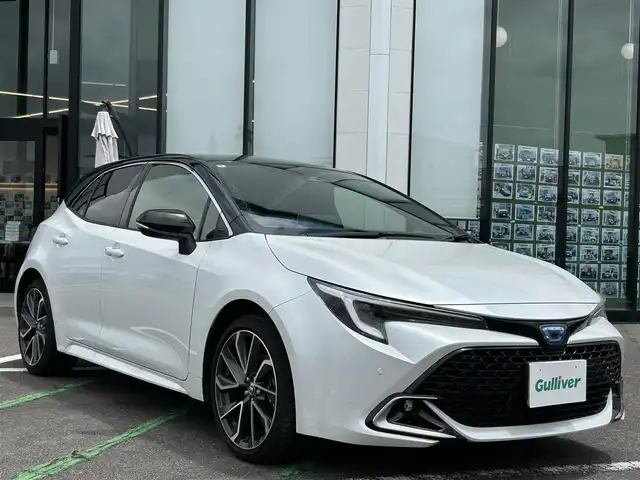 トヨタ カローラ スポーツ ハイブリッドG Z 長崎県 2024(令6)年 0.7万km アティチュードブラックマイカ/プラチナホワイトパールマイカ /ワンオーナー//純正ナビ/ (Apple Car play フルセグTV BT)//レーダークルーズコントロール//ビルドインETC2.0//トヨタセーフティーセンス//プリクラッシュセーフティ//レーントレーシングアシスト//レーンディパーチャアラート//ブラインドスポットモニター//パーキングサポートブレーキ//オートライト//LEDヘッドライト//コーナーセンサー//スマートキー//保証書　取扱説明書