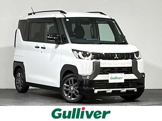 三菱 デリカミニ G プレミアム 愛媛県 2024(令6)年 1.4万km アメジストブラック/シルキーホワイト 社外メモリナビ　Bluetooth　CD　DVD　全周囲カメラ　e-Assist　FCM　EAPM　AHB　TSR　LCDN　LDW　LDP　DAA　PFCW　ハーフレザーシート　シートヒーター　ステアリングヒーター　社外ドライブレコーダー　スマートルームミラー