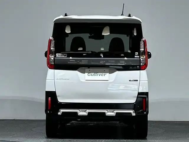 三菱 デリカミニ G プレミアム 愛媛県 2024(令6)年 1.4万km アメジストブラック/シルキーホワイト 社外メモリナビ　Bluetooth　CD　DVD　全周囲カメラ　e-Assist　FCM　EAPM　AHB　TSR　LCDN　LDW　LDP　DAA　PFCW　ハーフレザーシート　シートヒーター　ステアリングヒーター　社外ドライブレコーダー　スマートルームミラー