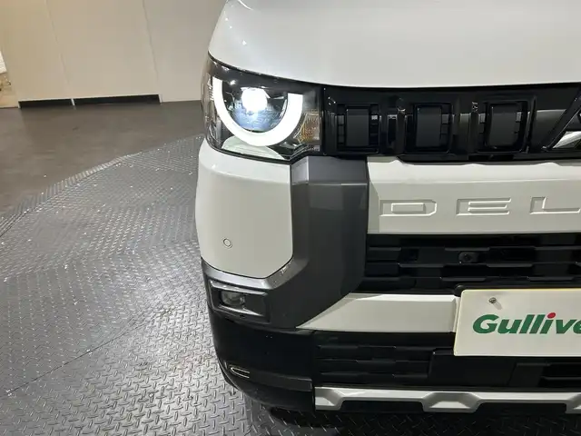 三菱 デリカミニ G プレミアム 愛媛県 2024(令6)年 1.4万km アメジストブラック/シルキーホワイト 社外メモリナビ　Bluetooth　CD　DVD　全周囲カメラ　e-Assist　FCM　EAPM　AHB　TSR　LCDN　LDW　LDP　DAA　PFCW　ハーフレザーシート　シートヒーター　ステアリングヒーター　社外ドライブレコーダー　スマートルームミラー