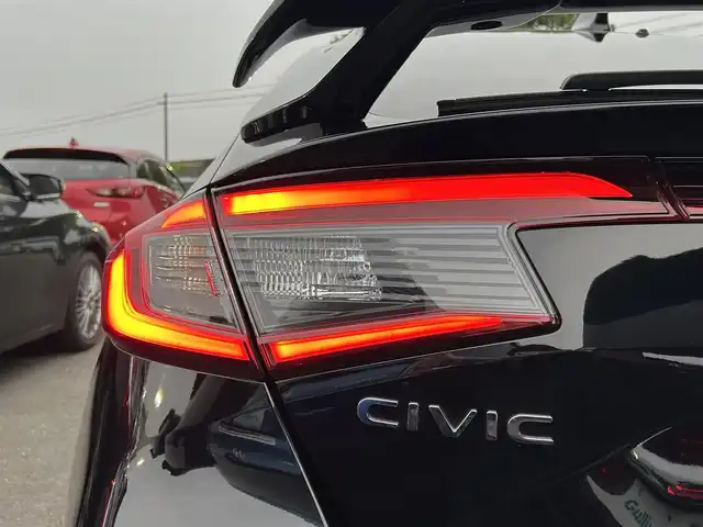 ホンダ シビック EX 静岡県 2023(令5)年 1.5万km クリスタルブラックパール HondaSENSING/純正コネクトナビ/　AM FM Bluetooth USB AppleCarPlay AndroidAuto/フルセグTV/バックモニター/前後方ドライブレコーダー/LEDオートヘッドランプ/レーダークルーズコントロール/ハーフレザーシート/シートヒーター(前席)/ワイヤレス充電/フロントロアスカート/ウイングスポイラー/ビルトインETC2.0/BOSEプレミアムサウンド/6速MT/パワーシート(前席)