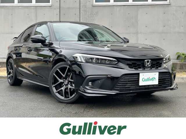 ホンダ シビック EX 静岡県 2023(令5)年 1.5万km クリスタルブラックパール HondaSENSING/純正コネクトナビ/　AM FM Bluetooth USB AppleCarPlay AndroidAuto/フルセグTV/バックモニター/前後方ドライブレコーダー/LEDオートヘッドランプ/レーダークルーズコントロール/ハーフレザーシート/シートヒーター(前席)/ワイヤレス充電/フロントロアスカート/ウイングスポイラー/ビルトインETC2.0/BOSEプレミアムサウンド/6速MT/パワーシート(前席)