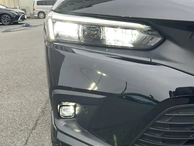 ホンダ シビック EX 静岡県 2023(令5)年 1.5万km クリスタルブラックパール HondaSENSING/純正コネクトナビ/　AM FM Bluetooth USB AppleCarPlay AndroidAuto/フルセグTV/バックモニター/前後方ドライブレコーダー/LEDオートヘッドランプ/レーダークルーズコントロール/ハーフレザーシート/シートヒーター(前席)/ワイヤレス充電/フロントロアスカート/ウイングスポイラー/ビルトインETC2.0/BOSEプレミアムサウンド/6速MT/パワーシート(前席)