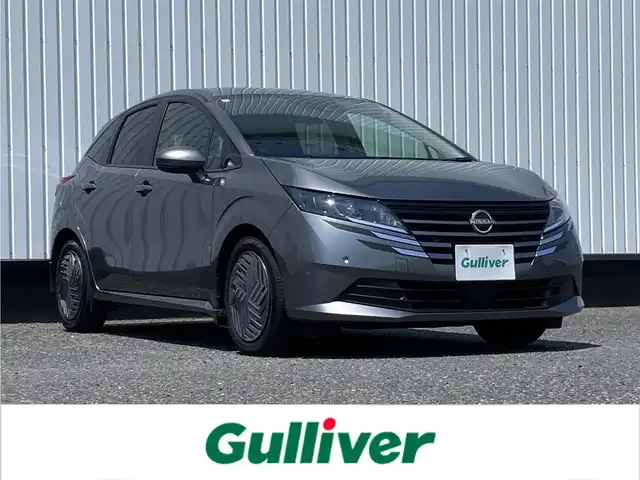 日産 ノート X 千葉県 2024(令6)年 2.8万km ダークメタルグレー 純正９インチナビ/(AM/FM/TV/Bluetooth)/HDMI/全周囲カメラ/デジタルインナーミラー/プロパイロット/置くだけ充電/衝突被害軽減システム/車線逸脱警報/クルーズコントロール/横滑り防止装置/ETC２．０/アイドリングストップ/LEDヘッドライト/オートライト/ウィンカーミラー/電動格納ミラー/シートリフター/プッシュスタート/スマートキー/フロアマット/スペアキー/取扱説明書/保証書