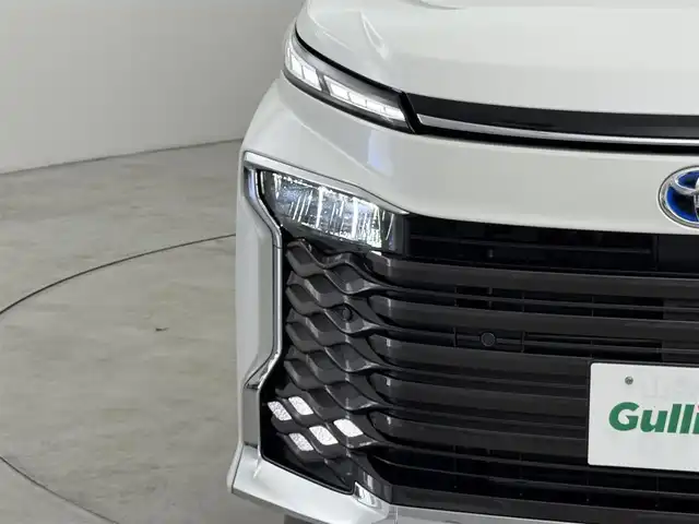 トヨタ ヴォクシー ハイブリッド S－Z 福岡県 2025(令7)年 0.1千km ホワイトパールクリスタルシャイン 登録済未使用車　/純正１０．５型ＤＡナビ　/バックカメラ　/ビルトインＥＴＣ２．０　/快適利便パッケージ　/レーダークルコン　/トヨタセーフティセンス　/衝突軽減ブレーキ/レーンキープ/アクセル踏み間違い防止/コーナーセンサー/両側電動スライドドア　/パワーバックドア　/ハーフレザーシート/シートヒーター　/ＬＥＤヘッドライト