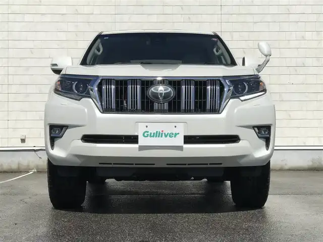 トヨタ ランドクルーザー プラド TX 富山県 2018(平30)年 10.8万km ホワイトパールクリスタルシャイン 4WD/RAYS17インチAW/純正ナビ/フルセグTV/Bluetooth/バックカメラ/プリクラッシュセーフティ/レーンキープアシスト/レーダークルーズコントロール/プッシュスタート/スマートキー/純正エンジンスターター/スペアキー１本/ウッドコンビ革巻きステアリング/ステアリングスイッチ/LEDヘッドライト/オートライト/オートハイビーム/ETC