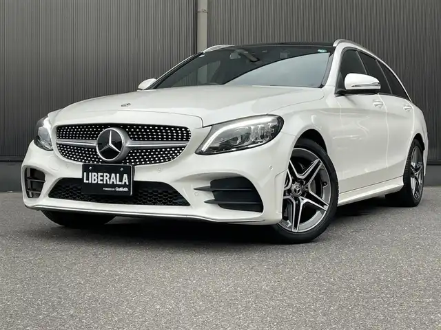 メルセデス・ベンツ Ｃ２２０ｄ ステーションワゴン アバンギャルドAMGライン 香川県 2018(平30)年 5.8万km ダイヤモンドホワイト アクティブブレーキアシスト/レーンチェンジアシスト/ブラインドスポットアシスト/パノラミックスライディングルーフ/純正ナビ/BT/USB/SD/AppleCarPlay/ブルメスターサウンド/ヘッドアップディスプレイ/ACC/パドルシフト/アンビエントライト/スマートキー/アイドリングストップ/ブラックレザーシート/パワーシート/シートヒーター/パワーバックドア/コーナーセンサー/LEDヘッドライト
