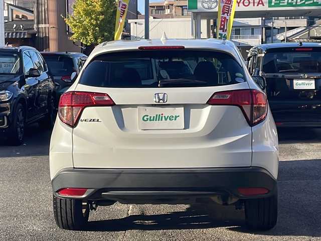 ホンダ ヴェゼル 愛知県 2016(平28)年 5.1万km ホワイトオーキッドパール /ワンオーナー//禁煙車//Bluetooth・FM・AM・//フルセグテレビ//純正ディーラーナビ//バックカメラ//後席会話サポート//クルーズコントロール//ETC//保証書//取扱説明書//記録簿//スペアキー（1本）//スマートキー//電動格納ミラー//オートライト//ハロゲンフォグランプ//純正16インチアルミホイール//ABS//TCS//横滑り防止//Gマット//ISOFIX//ブレーキホールド//ブレーキアシスト//衝突安全ボディー//EBD//盗難防止システム//UVカットガラス//プライバシーガラス//プッシュスタート//革巻きステアリング