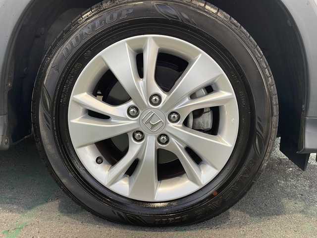 ホンダ ヴェゼル 愛知県 2016(平28)年 5.1万km ホワイトオーキッドパール /ワンオーナー//禁煙車//Bluetooth・FM・AM・//フルセグテレビ//純正ディーラーナビ//バックカメラ//後席会話サポート//クルーズコントロール//ETC//保証書//取扱説明書//記録簿//スペアキー（1本）//スマートキー//電動格納ミラー//オートライト//ハロゲンフォグランプ//純正16インチアルミホイール//ABS//TCS//横滑り防止//Gマット//ISOFIX//ブレーキホールド//ブレーキアシスト//衝突安全ボディー//EBD//盗難防止システム//UVカットガラス//プライバシーガラス//プッシュスタート//革巻きステアリング