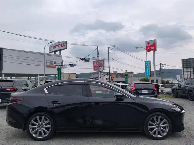 マツダ マツダ３セダン 15S ツーリング 熊本県 2021(令3)年 2万km ジェットブラックマイカ ワンオーナー/純正ナビ/【フルセグTV/CD/DVD/USB/BT/HDMI】/バックカメラ/i-ACTIVSENSE/スマートブレーキサポート/車線逸脱警報/コーナーセンサー/ブラインドスポットモニター/ステアリングリモコン/LEDオートライト/フォグランプ/オートハイビーム/電子パーキング/オートホールド/純正18インチアルミホイール/純正フロアマット/スペアキー/取扱説明書/保証書