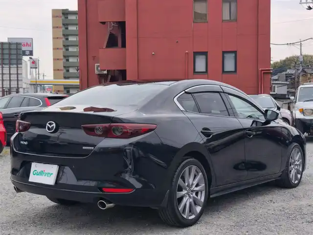 マツダ マツダ３セダン 15S ツーリング 熊本県 2021(令3)年 2万km ジェットブラックマイカ ワンオーナー/純正ナビ/【フルセグTV/CD/DVD/USB/BT/HDMI】/バックカメラ/i-ACTIVSENSE/スマートブレーキサポート/車線逸脱警報/コーナーセンサー/ブラインドスポットモニター/ステアリングリモコン/LEDオートライト/フォグランプ/オートハイビーム/電子パーキング/オートホールド/純正18インチアルミホイール/純正フロアマット/スペアキー/取扱説明書/保証書