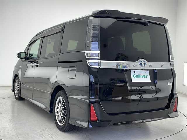 トヨタ ヴォクシー ハイブリッド ZS 煌 千葉県 2018(平30)年 7万km ブラック トヨタセーフティセンス/衝突軽減ブレーキ/レーンキープアシスト/純正10インチSDナビ/純正フリップダウンモニター/フルセグ/Bluetooth/CD/DVD/ETC/両側パワースライドドア/TRDサスペンション/純正フロアマット/純正ドアバイザー/ISOFIX/純正アルミホイール/シートヒーター（前席）