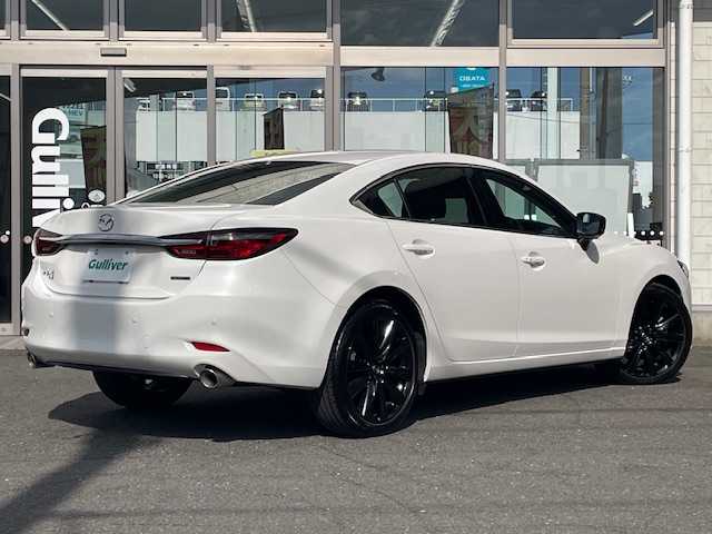 マツダ マツダ６セダン XD ブラックトーンエディション 青森県 2022(令4)年 1.5万km スノーフレイクホワイトパールマイカ ディーゼル車/４WD/MT車/車検令和9年7月/純正ディスプレイオーディオ/FM/AM/CD/DVD/Bluetooth/USB/AUX/BOSEサウンド/本革赤革シート/シートメモリー/パワーシート/360°ビューモニター/シートヒーター/ステアリングヒーター/レーダークルーズコントロール/シートベンチレーション/前後ドライブレコーダー/LEDヘッドライト/オートライト/オートハイビーム/ETC/純正AW19インチ/社外AW17インチスタッドレスタイヤ車載/取扱説明書/保証書