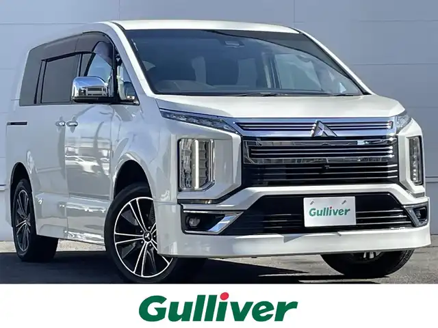 三菱 デリカＤ：５ アーバンギア G パワーパッケージ 佐賀県 2019(平31)年 5.6万km ウォームホワイトパール 7人乗り　/衝突軽減ブレーキシステム/レーダークルーズコントロール/車線逸脱警報システム/純正10.1型ナビ/・マルチアラウンドモニター/・フルセグTV/BT/CD/DVD/HDMI(USB接続タイプ)/社外11.5型後席モニター/パワーバックドア/両側パワースライドドア/純正18インチAW/シートヒーター/LEDヘッドライト/オートマチックハイビーム/フォグランプ/社外ドラレコ　/ETC/電動パーキングスイッチ/パドルシフト/ステアリングスイッチ/アイドリングストップ/スペアキー×1/取扱説明書/保証書