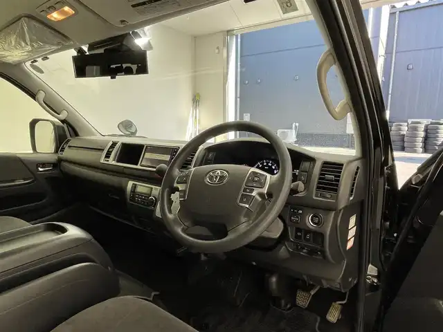 トヨタ ハイエース GL ロング 滋賀県 2022(令4)年 4.2万km ブラックマイカ 純正7インチナビ/【Bluetooth/CD/DVD/フルセグTV】/純正フリップダウンモニター/片側パワースライドドア/バックカメラ/フロントモデリスタエアロ/クリアランスソナー/前後ドライブレコーダー/LEDヘッドライト/オートマチックハイビーム/レーンキープアシスト/ビルトインETC/プッシュスタート/スマートキー/ステアリングリモコン