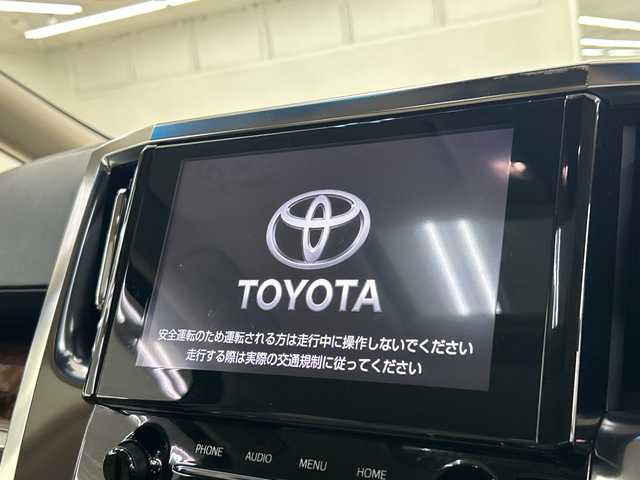 トヨタ ヴェルファイア ハイブリット V Lエディション 神奈川県 2020(令2)年 5万km ホワイトパールクリスタルシャイン 純正9型ディスプレイオーディオ/ツインムーンルーフ/トヨタセーフティセンス/ドライブレコーダー(前後)/車線逸脱警報/バックカメラ/フリップダウンモニター/サンルーフ/レザーシート/両側パワースライドドア/横滑り防止装置/ETC2.0/アイドリングストップ/LEDヘッドライト/フォグランプ/オートライト/ウィンカーミラー/電動格納ミラー/純正17インチAW/シートヒーター/エアシート/シートリフター/ステアリングヒーター/プッシュスタート/スマートキー/フロアマット/保証書/衝突被害軽減ブレーキ/レーントレーシングアシスト/レーダークルーズコントロール/オートマチックハイビーム/緊急時操舵支援