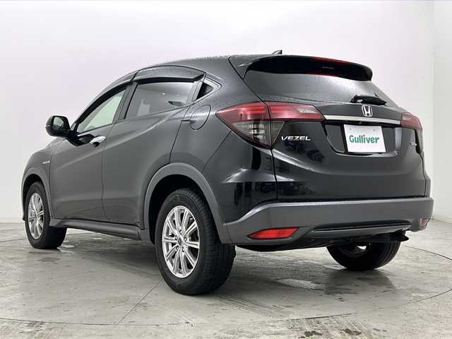 ホンダ ヴェゼル ハイブリッド ホンダセンシング 宮城県 2018(平30)年 6.1万km クリスタルブラックパール 禁煙車/Honda SENSING				/・衝突軽減ブレーキ/・路外逸脱抑制機能/・先行車発進お知らせ機能/・アダプティブクルーズコントロール/・車線維持支援システム/・標識認識機能/・誤発進抑制機能/・オートハイビーム/純正8型ナビ/・BT.CD.DVD.HDMI.USB/バックカメラ/フルセグTV/ビルトインETC/プッシュスタート/スマートキー×2/パドルシフト/ステアリングスイッチ/電子パーキングブレーキ/純正フロアマッド/LEDヘッドライト/社外16インチアルミホイール/アイドリングストップ/横滑り防止機能