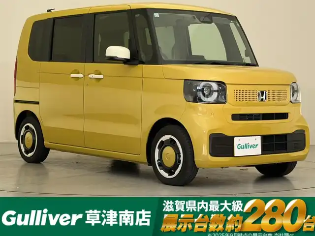 ホンダ Ｎ ＢＯＸ 滋賀県 2024(令6)年 0.2万km オータムイエローパール 純正8インチナビ/【Bluetooth/USB/iPod/フルセグ】/バックカメラ/両側パワースライドドア/シートヒーター/追従クルーズコントロール/レーンキープアシスト/衝突被害軽減ブレーキ/クリアランスソナー/オートライト/オートハイビーム/純正LED/電子パーキング/オートホールド/プッシュスタート/スマートキー/後席サンシェード/ステアリングスイッチ