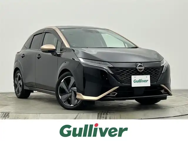 日産 オーラ G レザーエディション 宮城県 2021(令3)年 2.6万km ミッドナイトブラック/サンライズカッパー メーカーナビ/プロパイロット/ＢＯＳＥサウンド/グレー革シート/インテリジェントルームミラー/全周囲カメラ/エマージェンシーブレーキ/車線逸脱抑制/誤発進抑制/後側方車両検知警報/電子制御パーキングブレーキ/オートホールド/前後ソナー/オートハイビーム/ＥＴＣ２．０/ＨＤＭＩ入力端子/ＬＥＤヘッドライト/スマートフォン連携/フルセグＴＶ/禁煙車