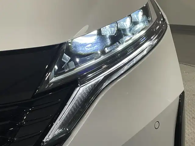 日産 オーラ ニスモ 愛知県 2023(令5)年 4.2万km ピュアホワイトパール/スーパーブラック 純正９インチナビ/プロパイロット/アラウンドビューモニター/エマージェンシーブレーキ/ブラインドスポットモニター/車線逸脱警報/クリアランスソナー/電動パーキングブレーキ/ブレーキホールド/ハーフレザー/ハンドルヒーター/シートヒーター/ワイヤレス充電/デジタルインナーミラー/ドライブレコーダー/ビルトインＥＴＣ２．０　/USB＆HDMI入力端子/アクセサリーソケット/ISOFIX/純正フロアマット/純正17インチアルミホイール