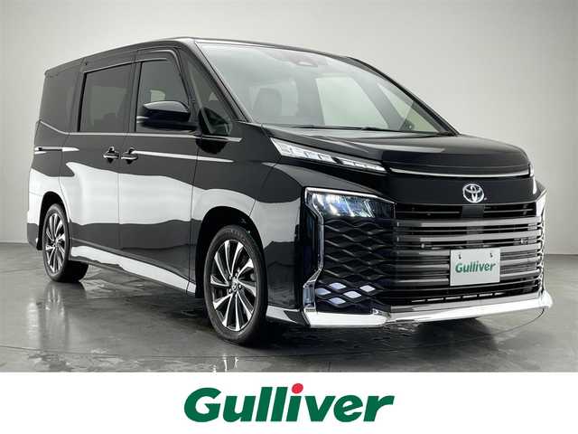 トヨタ ヴォクシー ハイブリッド S－Z 愛知県 2022(令4)年 7.2万km アティチュードブラックマイカ 純正１０．５型ディスプレイオーディオプラス/ナビ/ＨＤＭＩ/禁煙車/フリップダウンモニター（純正１４インチ）/バックカメラ/シートヒーター/フルセグTV/ＤＶＤ/CD再生機能有/ドライブレコーダー/ＥＴＣ2.0/追従クルーズコントロール/トヨタセーフティセンス/衝突被害軽減システム/車線逸脱/ＬＥＤオートライト/オートマチックハイビーム/ＡＣ１００Ｖ１５００W/両側パワースライドドア/USB端子/Bluetooth/プッシュスタート/スマートキー