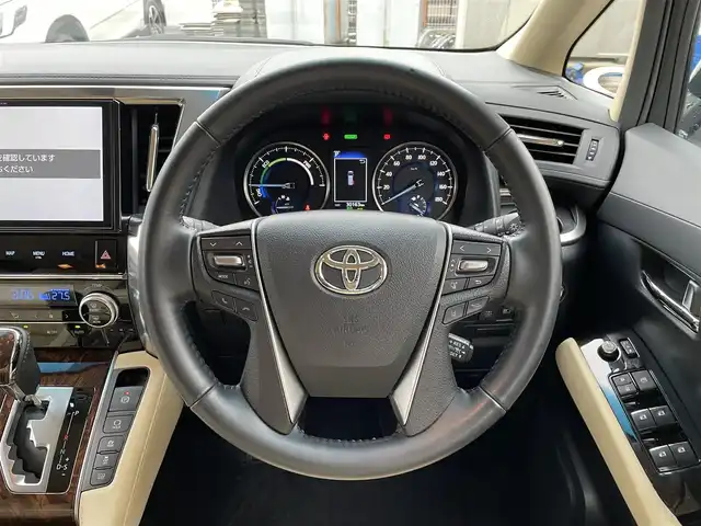 トヨタ アルファードハイブリット X 岩手県 2019(平31)年 3.1万km ホワイトパールクリスタルシャイン 純正SDナビ/（フルセグTV/CD/DVD/Bluetooth）/純正フリップダウンモニター/モデリスタエアロ/デジタルインナーミラー/ステアリングリモコン/両側パワースライドドア /前後ドライブレコーダー/AVH/BSM/レーダークルーズコントロール/ビルドインETC