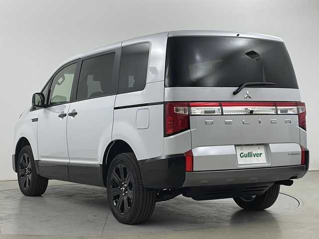三菱 デリカＤ：５ シャモニー 道央・札幌 2025(令7)年 0.1万km未満 白Ⅱ ・4WD/・CHAMONIX　７人乗り/・e-Assist/・11インチメモリナビ/・ＤＶＤ・ＣＤ・ＢＴ・ＳＤ・フルセグTV/・全方位カメラ/・両側パワースライドドア/・パワーバックドア/・レーダークルーズコントロール/・LEDヘッドライト/フォグランプ/・ハーフレザーシート/・パワーシート/・ステアリングヒーター/・純正18インチアルミホイール/・パドルシフト/・アイドリングストップ/・横滑り防止装置/・レーンアシスト/・スペアキー(1本)/・スマートキー