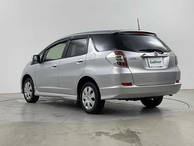 ホンダ フィット シャトル 15X 道央・札幌 2013(平25)年 5.8万km アラバスターシルバーメタリック ・4WD /コンフォートビューPG/・純正VXM-１４５VSIナビ/・DVD.CD.SD.ワンセグ/・Bluetooth/・バックカメラ/・ハーフレザーシート/・D.N席シートヒーター/ミラーヒーター/・HIDライト/オートライト/・クルーズコントロール/・ビルトインETC/・保証証/取扱説明書