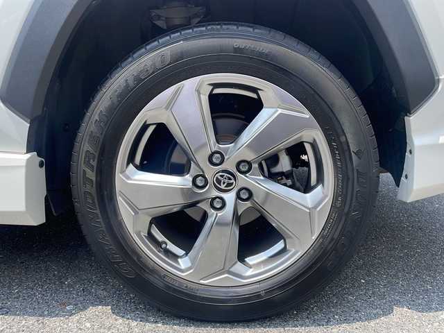 トヨタ ＲＡＶ４ ハイブリットG 広島県 2021(令3)年 6.2万km ホワイトパールクリスタルシャイン /登録時走行距離/　　　　　　　61556キロ/ワンオーナー/純正ディスプレイオーディオ/パノラミックビューモニター/地デジ/ハーフレザーシート/シートヒーター/PCS/モデリスタエアロ/パワーバックドア/デジタルインナーミラー/スペアキー×１/ビルトンETC/新車時整備手帳/　　【保証書】/取扱説明書/