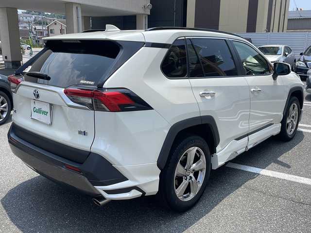 トヨタ ＲＡＶ４ ハイブリットG 広島県 2021(令3)年 6.2万km ホワイトパールクリスタルシャイン /登録時走行距離/　　　　　　　61556キロ/ワンオーナー/純正ディスプレイオーディオ/パノラミックビューモニター/地デジ/ハーフレザーシート/シートヒーター/PCS/モデリスタエアロ/パワーバックドア/デジタルインナーミラー/スペアキー×１/ビルトンETC/新車時整備手帳/　　【保証書】/取扱説明書/