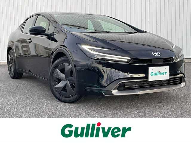 トヨタ プリウス U 滋賀県 2025(令7)年 0.3万km アティチュードブラックマイカ 純正８型ディスプレイ/・Bluetooth/フルセグ/・ミラキャスト/バックカメラ/革巻きステアリング/ステアリングリモコン/ETC２．０/前後ドライブレコーダー/レーダークルコン/オートリトラミラー/AC１００V/オートハイビーム/LEDオートライト/レーンディパーチャーアラート/プリクラッシュセーフティ/プロアクティブドライビングアシスト/クリアランスソナー/パーキングサポートブレーキ/ロードサインアシスト/スマートキー