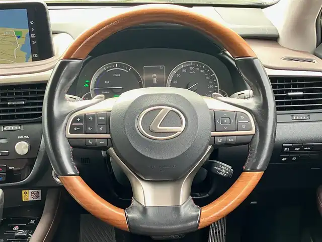 レクサス ＲＸ 450hL 静岡県 2019(令1)年 5.2万km グラファイトブラックガラスフレーク 純正12.3インチナビ(CD/DVD/BT/フルセグ)/全方位カメラ/サンルーフ/後席モニター/電動リアゲート/3眼LEDヘッドライト/1~2列目シートヒーター/D席N席パワーシート/D席N席エアシート/パドルシフト/ETC2.0/エンジンスタートボタン/パワーステアリング/パワーウィンドウ/保証書/取扱説明書/記録簿/4WD/100V充電/アイドリングストップ/スマートキー/Wオートエアコン/レーダークルーズコントロール/USB入力端子/電動格納サードシート/純正フロアマット/純正20インチアルミホイール/レザーシート/ルーフレール/ABS/横滑り防止装置/コーアンーセンサー前後/レーンキープアシスト/オートマチックハイビーム/W+サイドエアバッグ/カーテンエアバッグ/ステアリングヒーター/HDMI接続/BSM/ヘッドアップディスプレイ/ワイヤレス充電/２列目真ん中の席、ヘッドレストなし