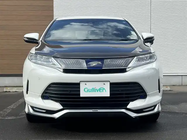 トヨタ ハリアー プレミアム 秋田県 2019(平31)年 16.2万km ホワイトパールクリスタルシャイン ４WD/衝突軽減システム/LEDヘッドライト/モデリスタエアロパーツ/純正メモリナビ（DVD/CD/BT/USB)/フルセグ/バックカメラ/トヨタ純正アルミ（冬タイヤ装着）/スマートキー/純正エンジンスターター/アイドリングストップ/プッシュスタート/コーナーセンサー/クルーズコントロール追従走行有/レーンキープアシスト/アダプティブ・フロントライティングシステム/MTモード付AT/ステアリングスイッチ/運転席パワーシート/ドライブレコーダー/ビルトインETC/電動リアゲート/電動パーキングブレーキ/オートブレーキホールド機能/100V充電/純正フロアマット/純正ドアバイザー/オートライト/オートエアコン/パワーステアリング/パワーウィンドウ/電動格納ウィンカーミラー/横滑り防止/盗難防止装置/寒冷地仕様/保証書/取扱説明書/記録簿