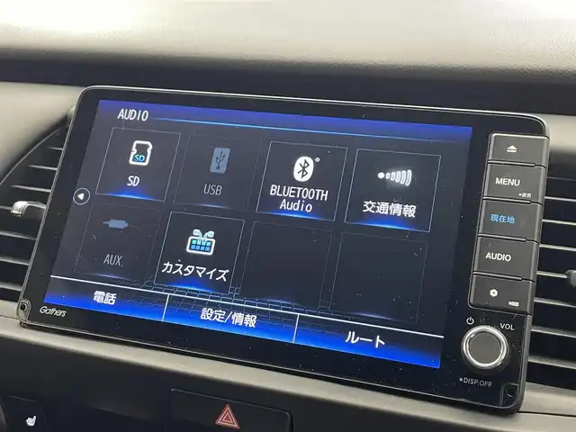 ホンダ フィット e:HEVリュクス 滋賀県 2022(令4)年 1.9万km ゴールド 純正9インチナビ/【Bluetooth/CD/DVD/フルセグTV】/ハーフレザーシート/バックカメラ/追従クルーズコントロール/クリアランスソナー/LEDヘッドライト/オートマチックハイビーム/前後ドライブレコーダー/D/Nシートヒーター/ステアリングヒーター/ビルトインETC/電動パーキングブレーキ/オートブレーキホールド/純正フロアマット/プッシュスタート/スマートキー/ステアリングリモコン