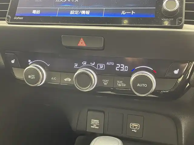 ホンダ フィット e:HEVリュクス 滋賀県 2022(令4)年 1.9万km ゴールド 純正9インチナビ/【Bluetooth/CD/DVD/フルセグTV】/ハーフレザーシート/バックカメラ/追従クルーズコントロール/クリアランスソナー/LEDヘッドライト/オートマチックハイビーム/前後ドライブレコーダー/D/Nシートヒーター/ステアリングヒーター/ビルトインETC/電動パーキングブレーキ/オートブレーキホールド/純正フロアマット/プッシュスタート/スマートキー/ステアリングリモコン