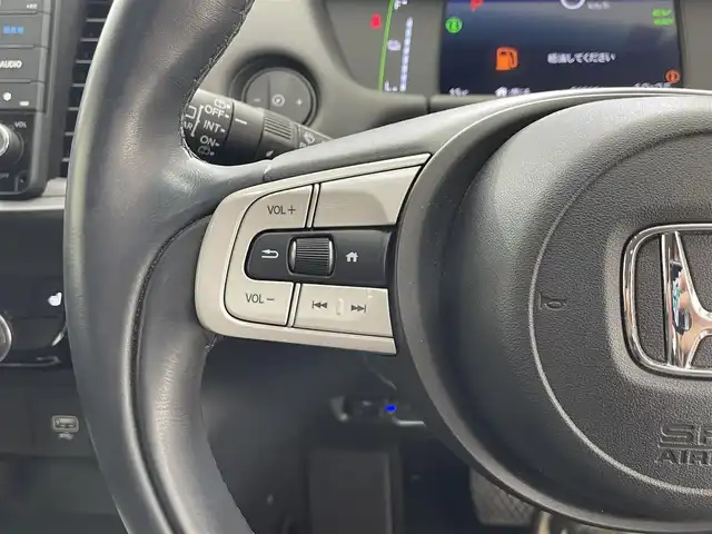 ホンダ フィット e:HEVリュクス 滋賀県 2022(令4)年 1.9万km ゴールド 純正9インチナビ/【Bluetooth/CD/DVD/フルセグTV】/ハーフレザーシート/バックカメラ/追従クルーズコントロール/クリアランスソナー/LEDヘッドライト/オートマチックハイビーム/前後ドライブレコーダー/D/Nシートヒーター/ステアリングヒーター/ビルトインETC/電動パーキングブレーキ/オートブレーキホールド/純正フロアマット/プッシュスタート/スマートキー/ステアリングリモコン