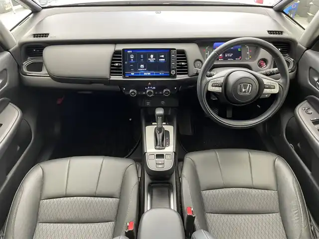 ホンダ フィット e:HEVリュクス 滋賀県 2022(令4)年 1.9万km ゴールド 純正9インチナビ/【Bluetooth/CD/DVD/フルセグTV】/ハーフレザーシート/バックカメラ/追従クルーズコントロール/クリアランスソナー/LEDヘッドライト/オートマチックハイビーム/前後ドライブレコーダー/D/Nシートヒーター/ステアリングヒーター/ビルトインETC/電動パーキングブレーキ/オートブレーキホールド/純正フロアマット/プッシュスタート/スマートキー/ステアリングリモコン