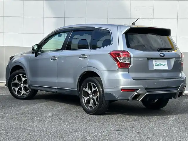 スバル フォレスター 2．0XT アイサイト 東京都 2012(平24)年 10.6万km アイスシルバーメタリック 純正フルエアロ/社外メモリーナビ/　DVD/CD/Bluetooth/全車速追従機能付クルーズコントロール/プリクラッシュブレーキ/先行車発進お知らせ/AT誤発進抑制/ふらつき警報/車線逸脱警報/前後ドライブレコーダー/ハーフレザーシート/パワーシート/シートヒーター/HIDヘッドライト/フォグランプ/オートライト/ETC/純正18インチアルミホイール/革巻きステアリングホイール/ステアリングスイッチ/パドルシフト/プッシュスタート/スマートキー/電動格納ミラー/ウインカーミラー/横すべり防止/フロアマット/ドアバイザー/取扱説明書/スペアキー