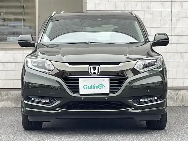 ホンダ ヴェゼル ハイブリッド Z ホンダセンシング 福岡県 2017(平29)年 8.4万km ミスティックグリーンパール ワンオーナー/純正8インチナビ【VXM-175VFEi】/　(AM/FM/CD/DVD/Bluetooth/フルセグTV)/バックカメラ/ホンダセンシング/・衝突軽減ブレーキ/・先行車発信お知らせ機能/・車両接近通報/・歩行者事故低減ステアリング/・路外逸脱抑制/・標識認識/・アダプティブクルーズコントロール/・車線維持支援/・パーキングセンサー/横滑り防止/オートマチックブレーキホールド/純正17インチアルミホイール/ルーフレール/黒色ハーフレザーシート/ビルトインETC/パドルシフト/革巻きステアリング/ステアリングスイッチ/シートヒーター(D/N)/純正フロアマット/フロントガラス熱線/USBポート/アクセサリーソケット/保証書/取扱説明書/ナビ取扱説明書