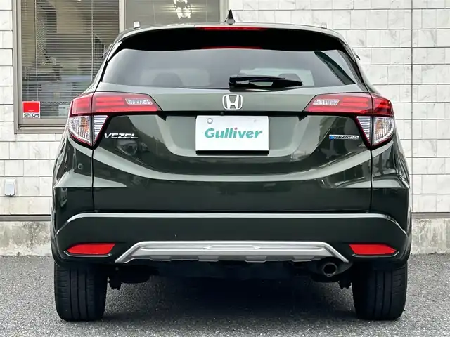 ホンダ ヴェゼル ハイブリッド Z ホンダセンシング 福岡県 2017(平29)年 8.4万km ミスティックグリーンパール ワンオーナー/純正8インチナビ【VXM-175VFEi】/　(AM/FM/CD/DVD/Bluetooth/フルセグTV)/バックカメラ/ホンダセンシング/・衝突軽減ブレーキ/・先行車発信お知らせ機能/・車両接近通報/・歩行者事故低減ステアリング/・路外逸脱抑制/・標識認識/・アダプティブクルーズコントロール/・車線維持支援/・パーキングセンサー/横滑り防止/オートマチックブレーキホールド/純正17インチアルミホイール/ルーフレール/黒色ハーフレザーシート/ビルトインETC/パドルシフト/革巻きステアリング/ステアリングスイッチ/シートヒーター(D/N)/純正フロアマット/フロントガラス熱線/USBポート/アクセサリーソケット/保証書/取扱説明書/ナビ取扱説明書