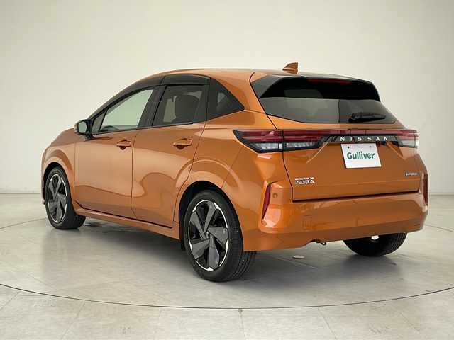 日産 オーラ G レザーエディション 千葉県 2021(令3)年 2.3万km プレミアムコロナオレンジ 純正ディスプレイオーディオ/・BT/USB/フルセグ/プロパイロット/衝突被害軽減ブレーキ/レーンキープアシスト/追従式クルーズコントロール/標識識別機能/オートハイビーム/電子パーキング/ビルトインETC2.0/全方位カメラ/純正ドライブレコーダー前後/純正フロアマット/置くだけ充電/BOSEサウンド