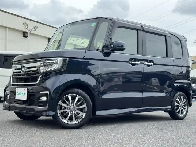 ホンダ Ｎ ＢＯＸ カスタム L 千葉県 2022(令4)年 1.4万km ミッドナイトブルービームM ワンオーナー/衝突被害軽減ブレーキ/車線逸脱防止支援システム/クルーズコントロール/コーナーセンサー/LEDヘッドライト/カーテンエアバッグ/純正メモリーナビ/Bluetooth/バックカメラ/フルセグTV/DVD再生/AM・FMラジオ/純正ETC/片側パワースライドドア/純正フロアマット/純正14インチアルミホイール/純正ドアバイザー/プッシュスタート/スマートキー/スペアキー/取扱説明書＆保証書メモリナビ