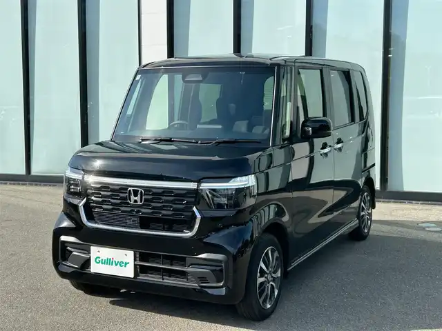 ホンダ Ｎ ＢＯＸ カスタム 大阪府 2024(令6)年 0.5万km クリスタルブラックパール 社外ナビ/　TV/CD/DVD/Bluetooth/USB/ナビ装着用SPパッケージ/バックカメラ/衝突軽減ブレーキ/横滑り防止装置　/片側パワースライドドア　/前席シートヒーター　/クルーズコントロール/レーンキープアシスト/純正１４インチアルミホイール　　/ホンダセンシング/ブレーキホールド/ＬＥＤヘッドライト